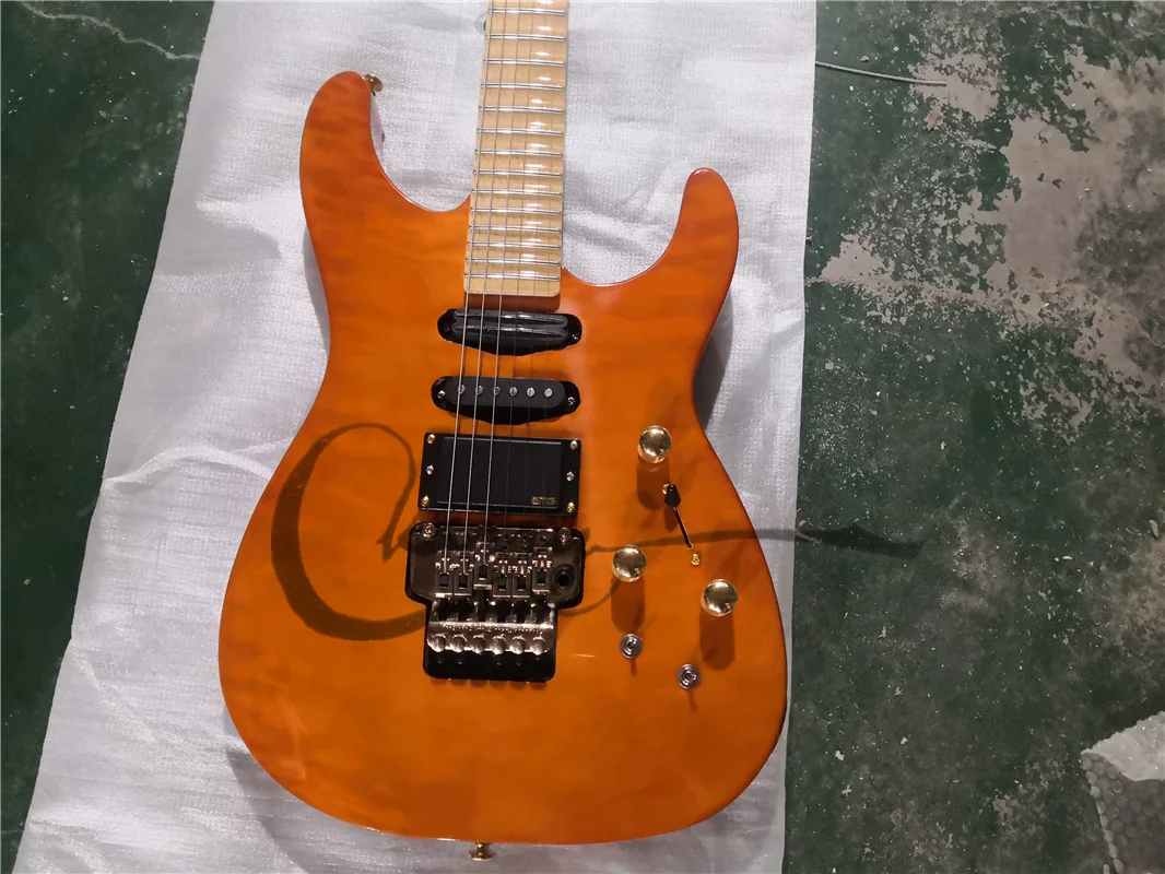 free shipping custom 6 string orange guitar,squiled maple veneer,tremolo bridge,SSH pickups,chamfer  groove maple fingerboard