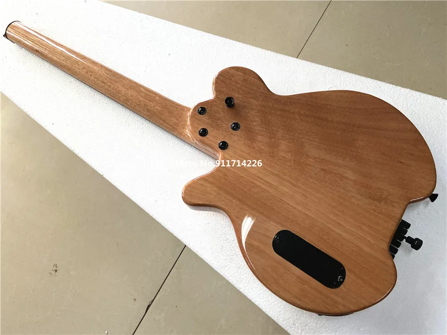 High-quality custom version of F hole headless electric guitar spruce panel double roll can be customized free shipping