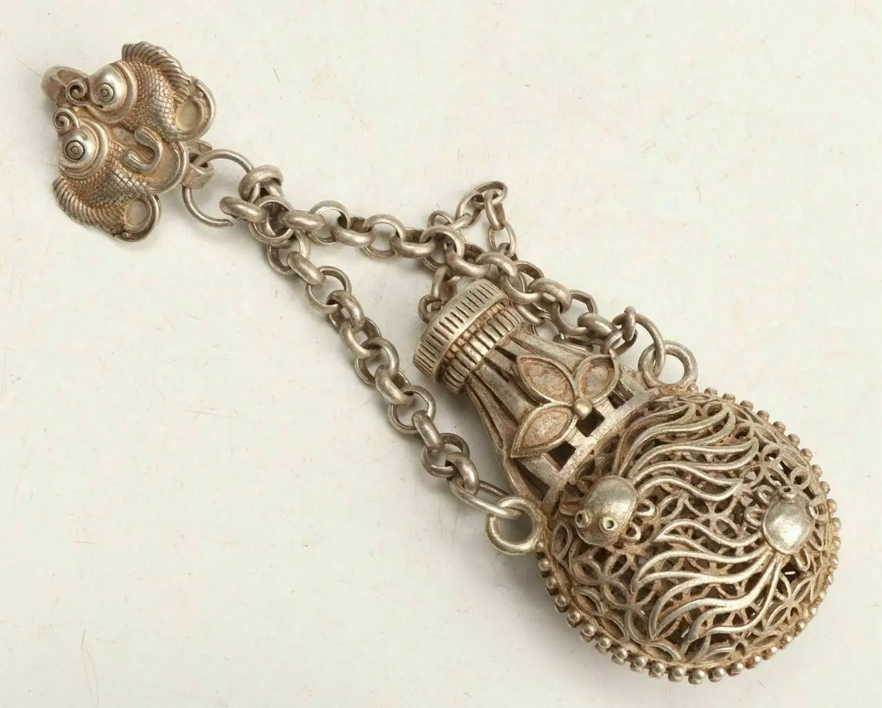 

Unique Tibetan Silver Snuff Bottle Pendant with Hollow Goldfish Mascot Ornament Antique Ethnic Style Collectible
