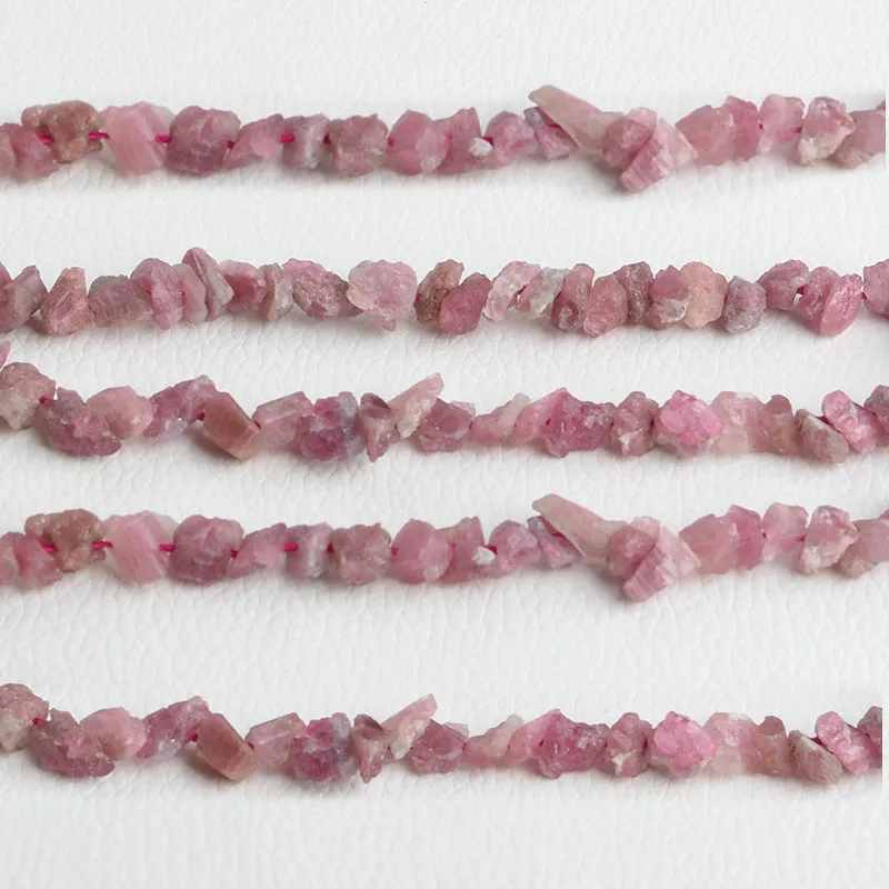 

2 strands 5-9mm Red Tourmaline Rough 15.5" Beads