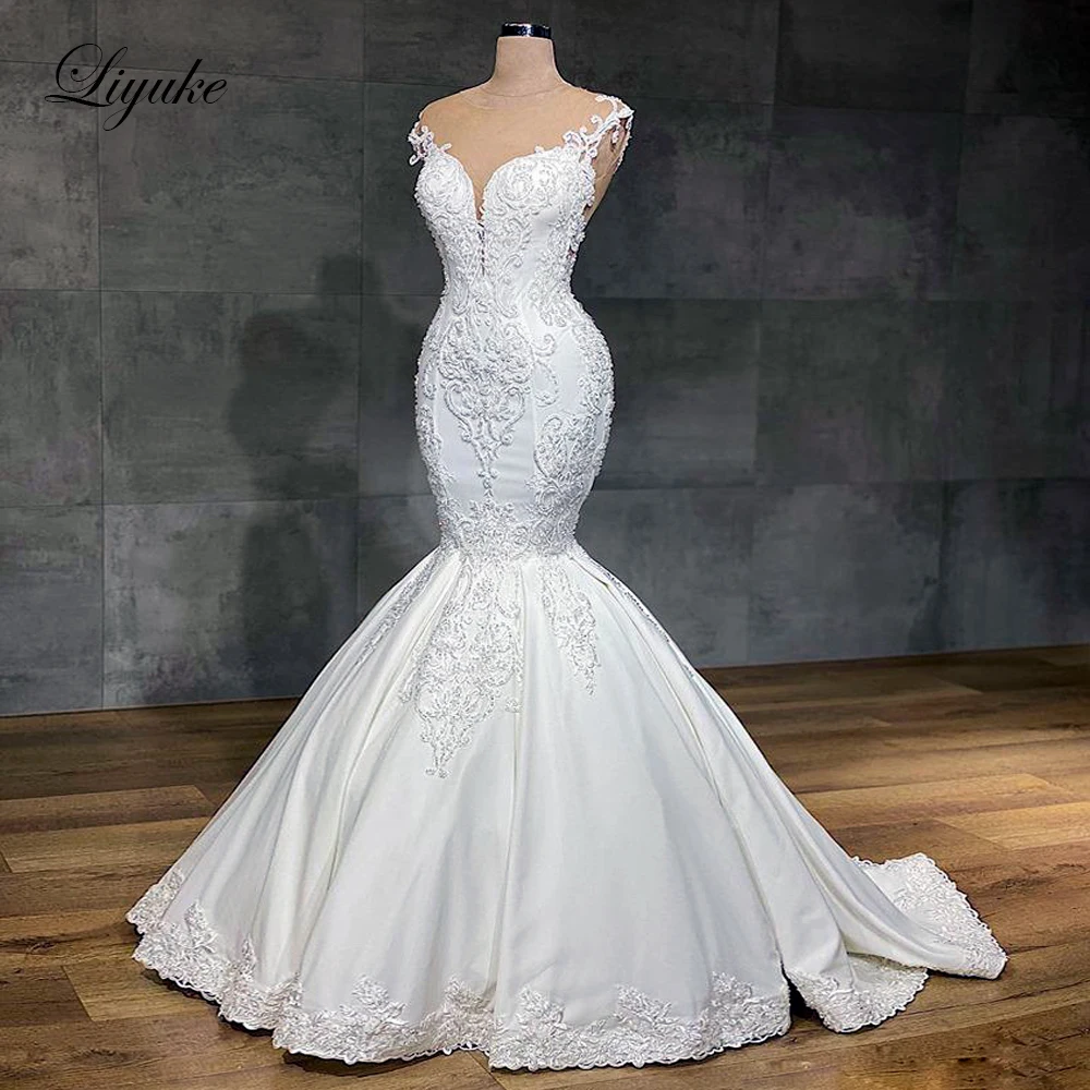 

Liyuke Exquisite Rhinestones Mermaid Wedding Dress 100% Real Photos Sleeveless Bride Dress Spaghetti Strap