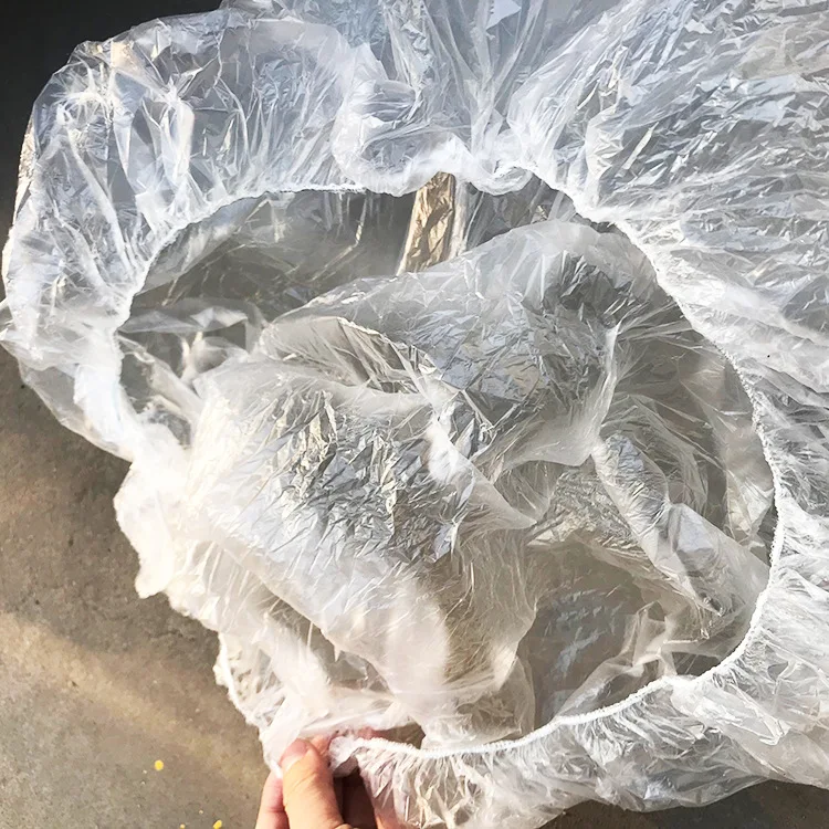Penutup pelindung plastik ban sekali pakai mobil antianjing Salah semprot urin cat tas transparan penutup universal 40