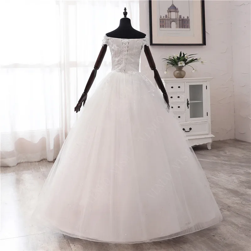 Vendita calda stile coreano scollo a barca Vestidos De Novia 2023 moda semplice abito da sposa con spalle scoperte Plus Size perle paillettes