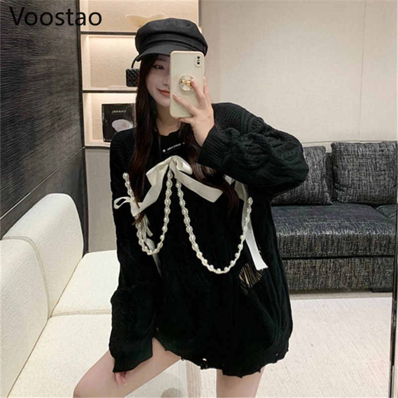 Autunno inverno dolce coreano perle sciolte catena fiocco buco lavorato a maglia Pullover donna elegante Chic o-collo maglione capispalla ragazze top