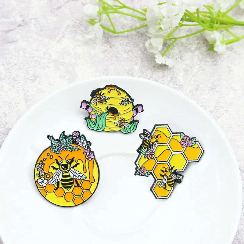 Cartoon cute bee and honeycomb honey enamel brooch creative interesting alloy badge backpack accessories gifts for friends