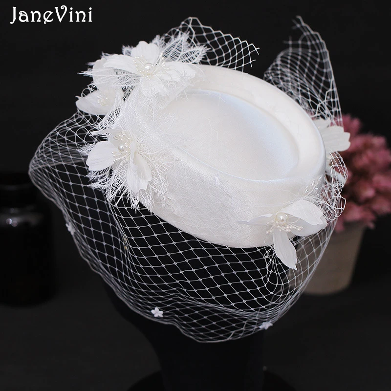 JaneVini 2021 Women Chic Ivory Fascinator Hat with Veil Wedding Party Church Headpiece 3D Flower Pearls Bridal Hair Accessories