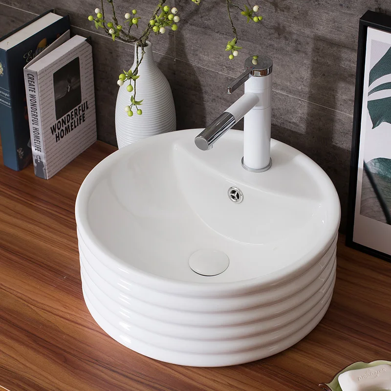 China Artistic Handmade Ceramic wash basin Round Counter top countertop round white ceramic wash basin bathroom sinks