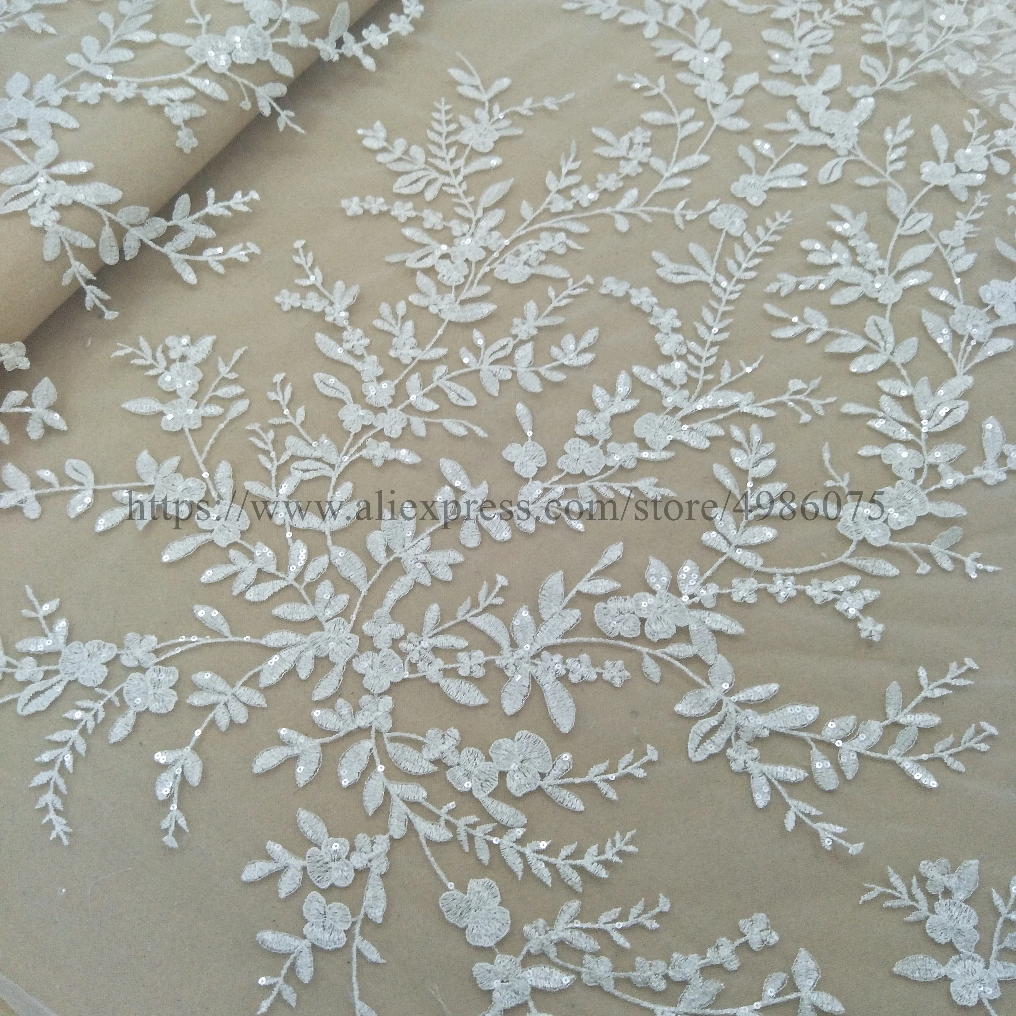 2021 Newest fashionable ivory bridal dress lace fabric 130cm width wedding gown dress lace fabric with sequins sell b yard