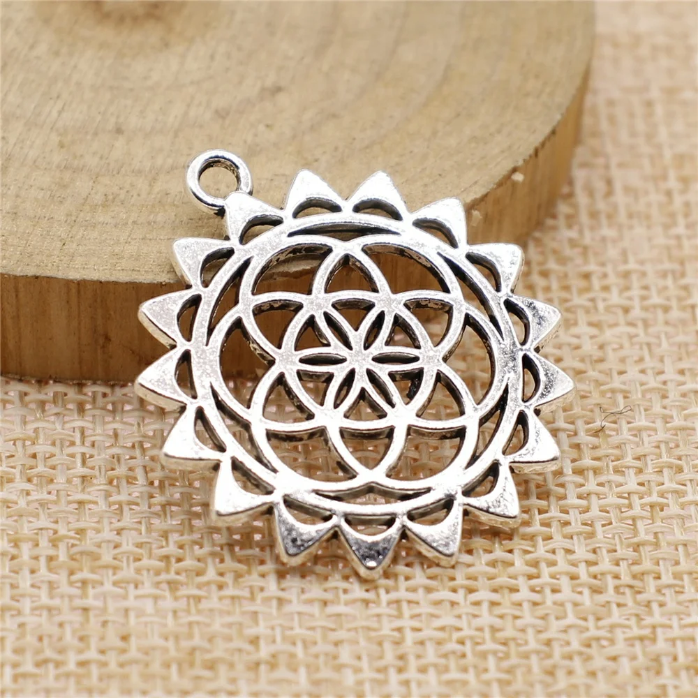 

Wholesale 50pcs/bag 33x30mm The Flower Of Life The Seed Of Life Charms Wholesale Antique Silver Color Charms Wholesale