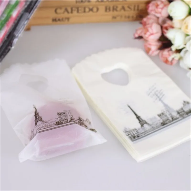 Hot Sale New Style Wholesale 50pcs/lot Eiffel Tower Mini Jewelry Plastic Gift Packaging Bags With Handles Small Gift Bags