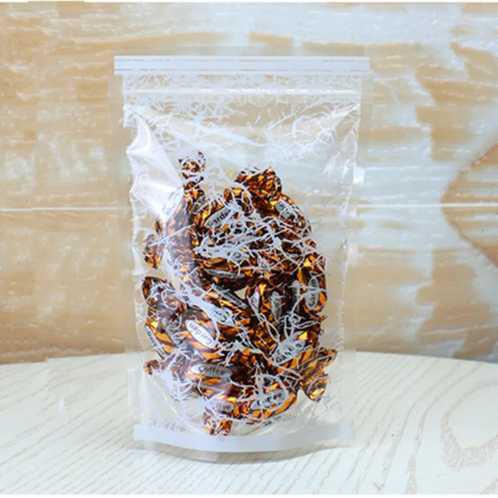 100Pcs Clear Plastic Stand Up Bag with Snowflake Printed Zip Lock Grip Seal Tear Notch Doypack Food Candy Coffee Bean Pouches