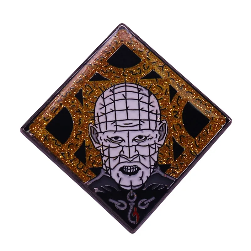 Hellraiser cult enamel pin which depicts the the golden puzzle box that unlocks a gateway to Hell!