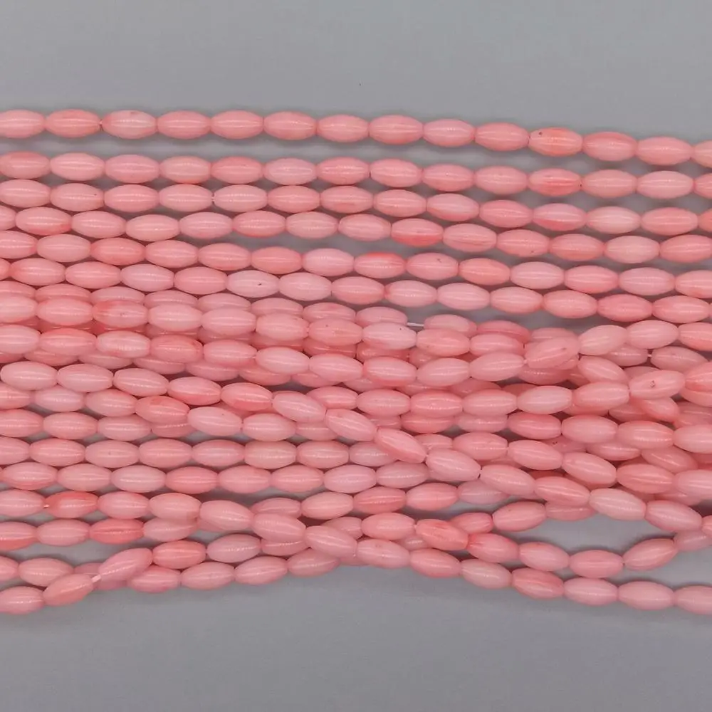 Großhandel 5 Stränge Rosa Korallen 4x8mm Glatte Reis Perlen 15 "Strand