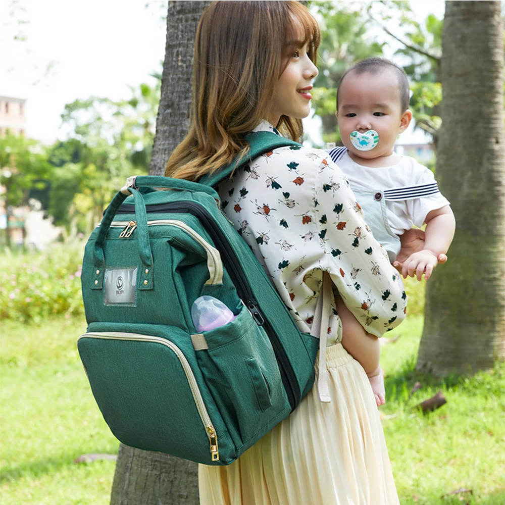 Tragbare Falten Bett Rucksack Baby Windel Tasche Mumie Kinderwagen Tasche Mutterschaft Wasserdichte Windel Tasche Große Kapazität Tasche