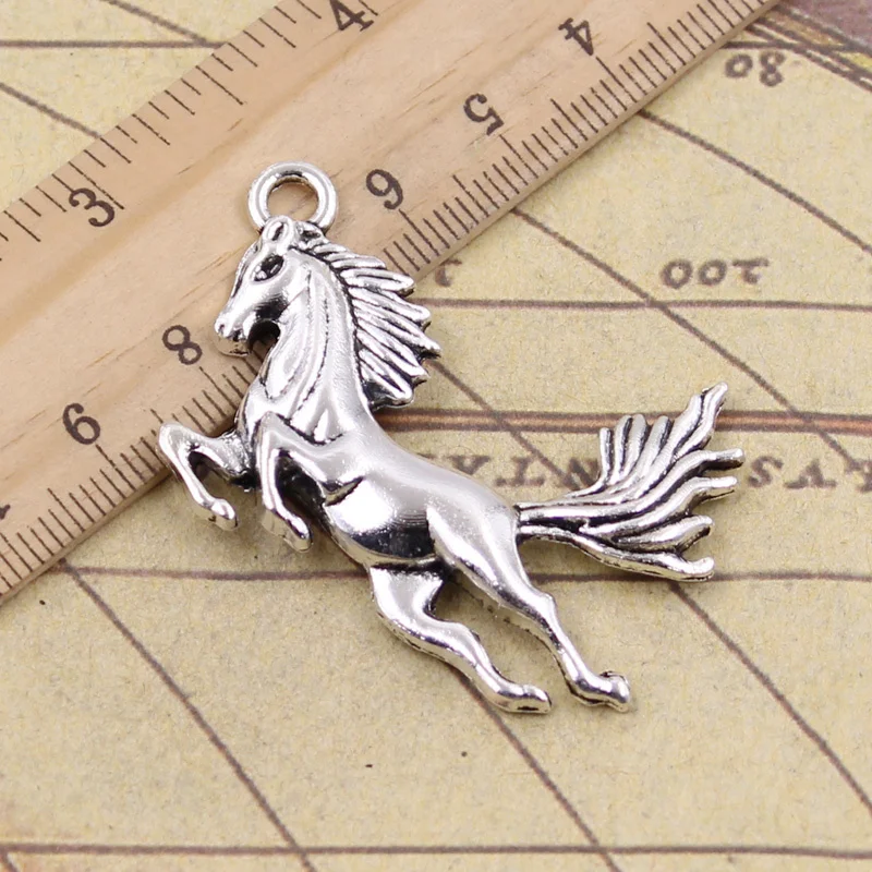8 sztuk Charms biegnący koń 51x32mm tybetański srebrny kolor zawieszki rzemiosło dokonywanie ustalenia Handmade antyczne DIY biżuteria
