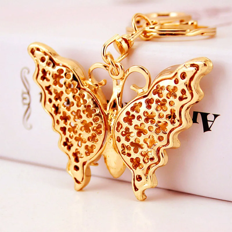 Creative jewelry pendant key chain opal butterfly car key chain lady bag accessories metal melon scissors insect key chain