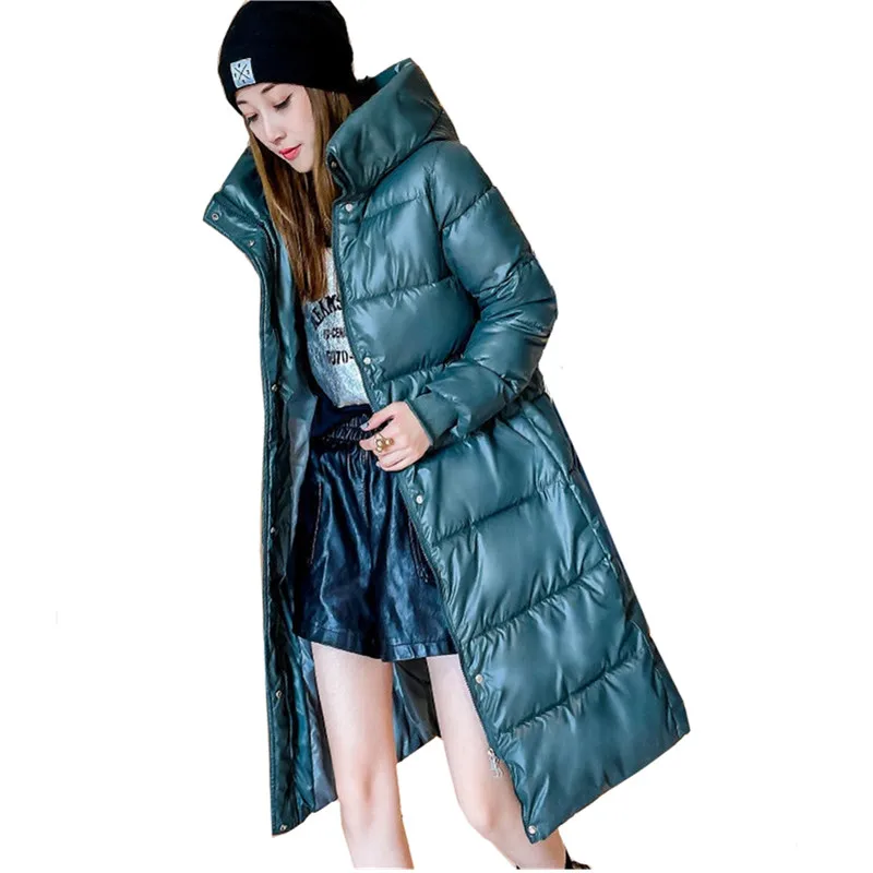 Chaqueta larga de invierno 2025 para mujer, Parkas de algodón grueso a la moda, prendas de vestir de talla grande 4XL, abrigo de nieve holgado a prueba de viento con capucha para mujer