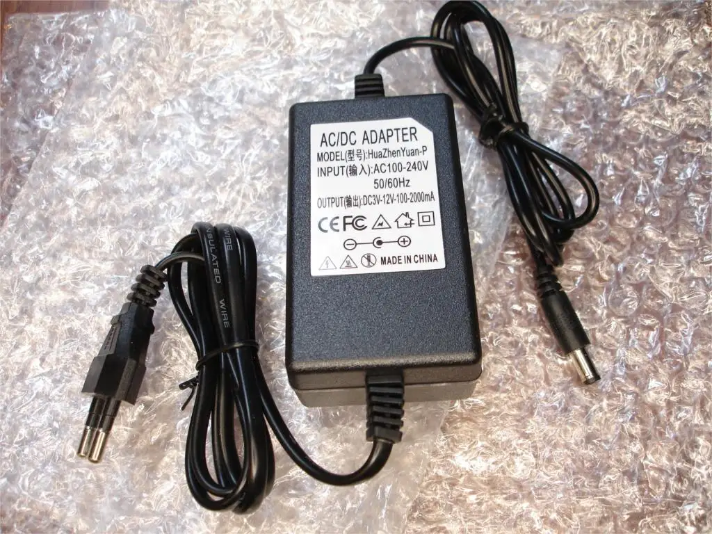 Adattatore universale regolabile da ca a cc 3-12V adattatore di alimentazione regolato in tensione 100-220V per telecamera CCTV striscia luminosa a LED