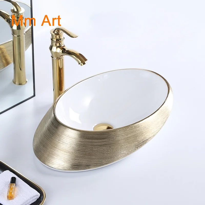 Hotel decor fancy luxury oval plated gold and white ceramic table top bathroom vessel sink art hand wash basin Bathroom sink