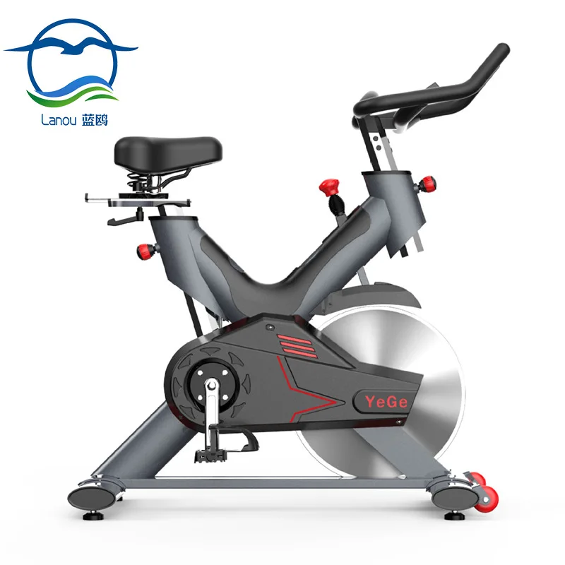 Commercial Large Flywheel Fitness Equipment Gray And Red Fiberglass Emergency Brake System Indoor Cycling Bikes