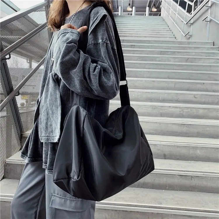 

Japan waterproof nylon couple bag 2022 new simple Joker shoulder strap Hong Kong style messenger bag