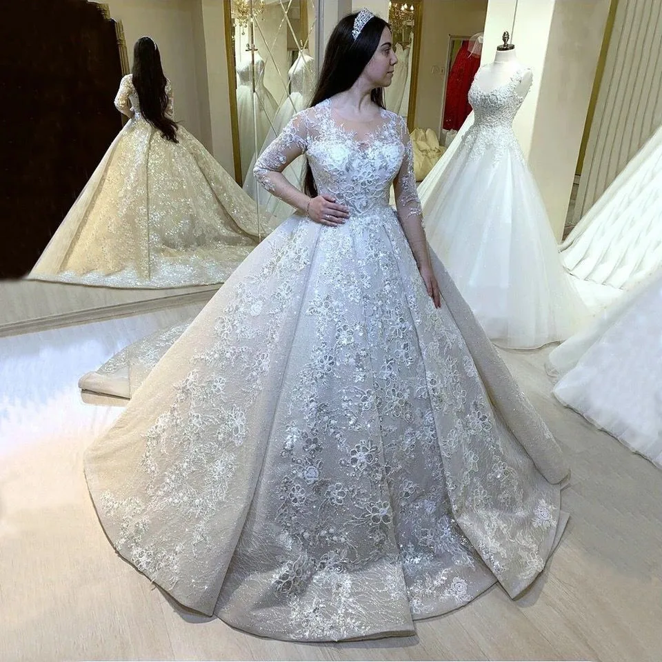 Arabskie koronkowe suknie ślubne Appliqued długie rękawy Ivory O Neck Bride suknie 2021 Marry Muslim Dubai Princess biała suknia ślubna