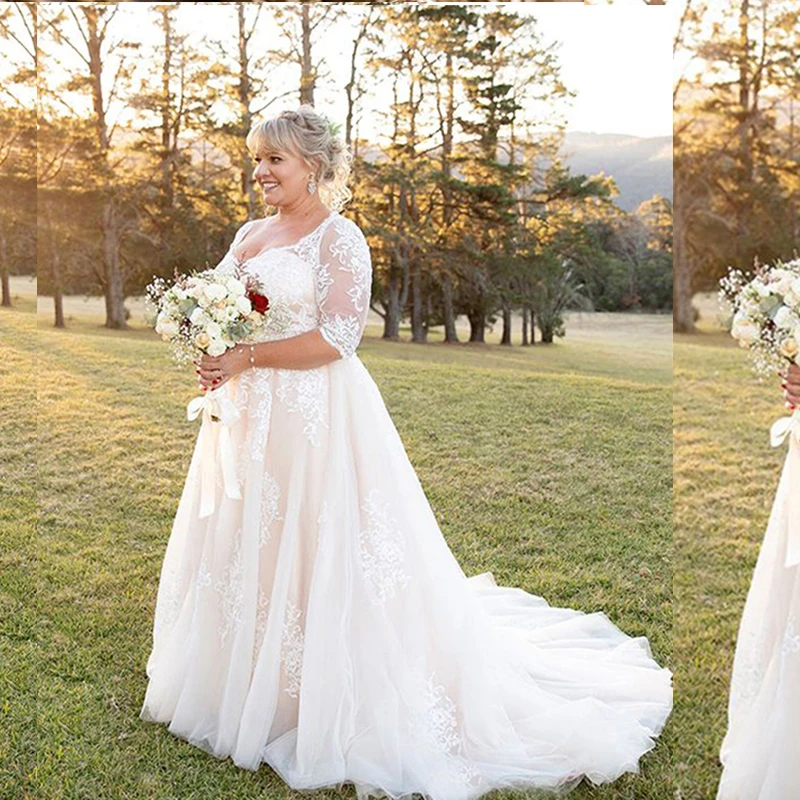 Robe de mariée élégante en dentelle bohème, grande taille, demi-manches, encolure dégagée, ligne A, jardin Boho