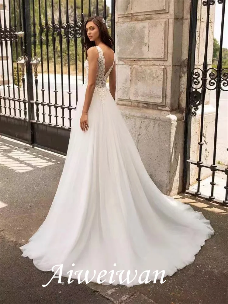 A-Line abiti da sposa scollo a V Sweep / Brush Train pizzo Tulle senza maniche spiaggia con applicazioni 2021