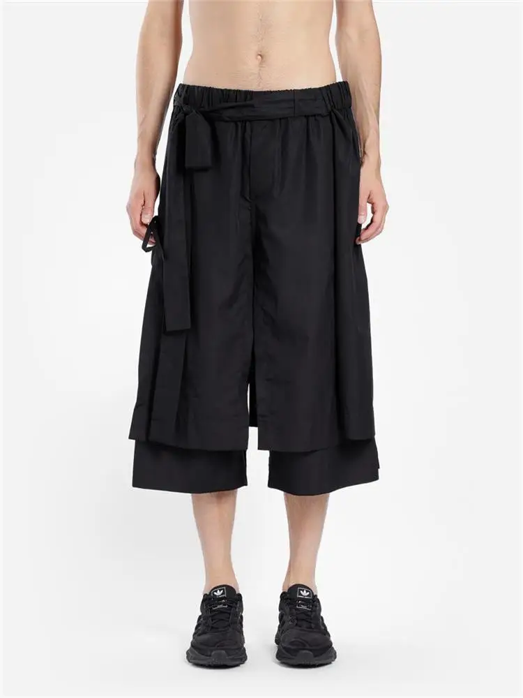 

Spring and autumn new men's irregular double trouser skirt fashion black loose seven minute trousers wide leg trousers