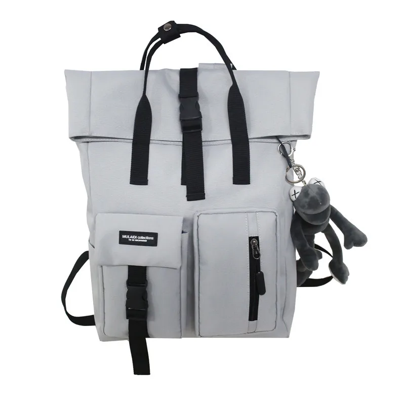 Japanese fashion backpack female high school students Korean tooling schoolbag male large capacity square travel computer bag.