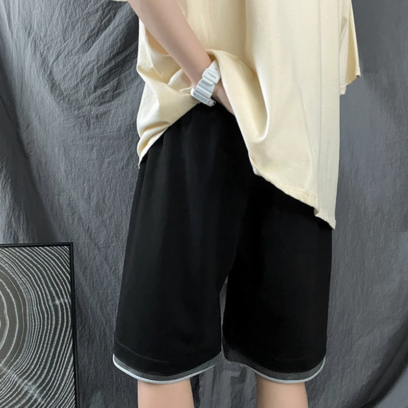 Fake 2-piece ins Capris Hong Kong style casual Korean version Sports Youth Summer elastic men's fashionable shorts students