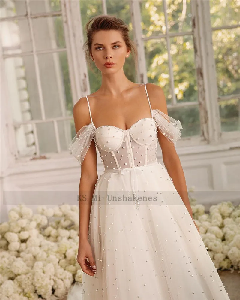 Abiti da sposa Boho avorio perle di lusso abiti da sposa spalline Vestido de Noiva A Line abito da sposa vintage Beach Women