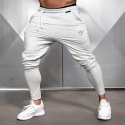 Pantalones de chándal informales para hombre, ropa deportiva de algodón para entrenamiento, gimnasio, trotar, primavera y otoño