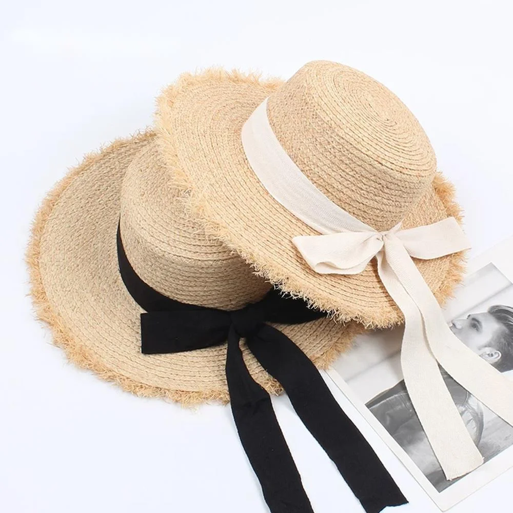 

2019 New summer sun hat bow 100%Raffia hat Visor Temperament flat Straw hats Women's Sea beach vacation leisure sunscreen hat