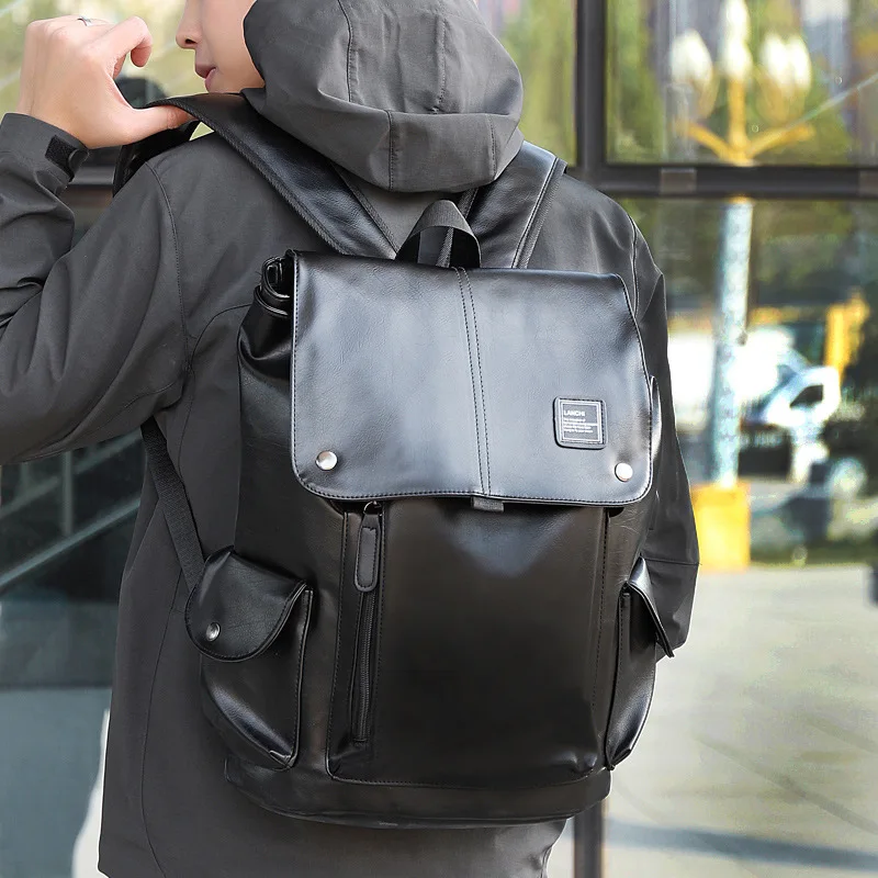 Moda marca de luxo dos homens mochila escolar de couro saco de viagem à prova dwaterproof água casual saco de livro de couro masculino