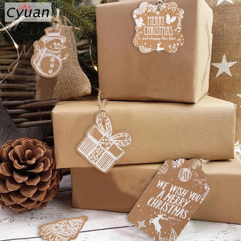 Cyuan 50pcs Regalo Di Natale Tag Babbo natale Fiocco di Neve di Carta Kraft Tag con la corda Etichetta Regalo di Natale per il Natale Del Partito