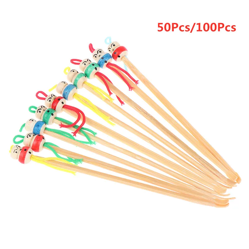 50pcs/100Pcs/lot Cartoons Cute Mini Doll Ear Picks Wood Bamboo Ear Picks Wax Remover Cleaner Ear Care Tool Random