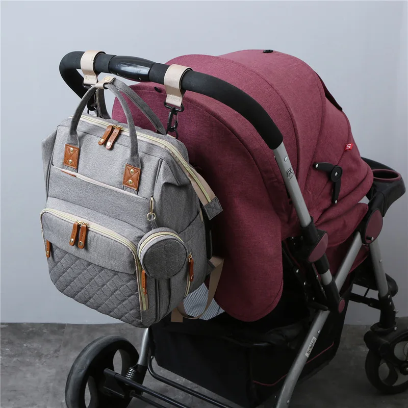 Portable mommy bag can hang baby stroller backpack Lightweight maternal and baby bag Multi-purpose large-capacity mom bed bag