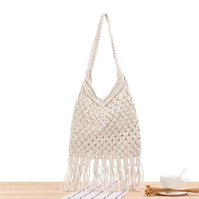 Factory Direct New Womens Hollow Hand-woven Straw Beach Bag Mesh Tassel Design Summer Foldable One Shoulder Shopping Bag IL00587