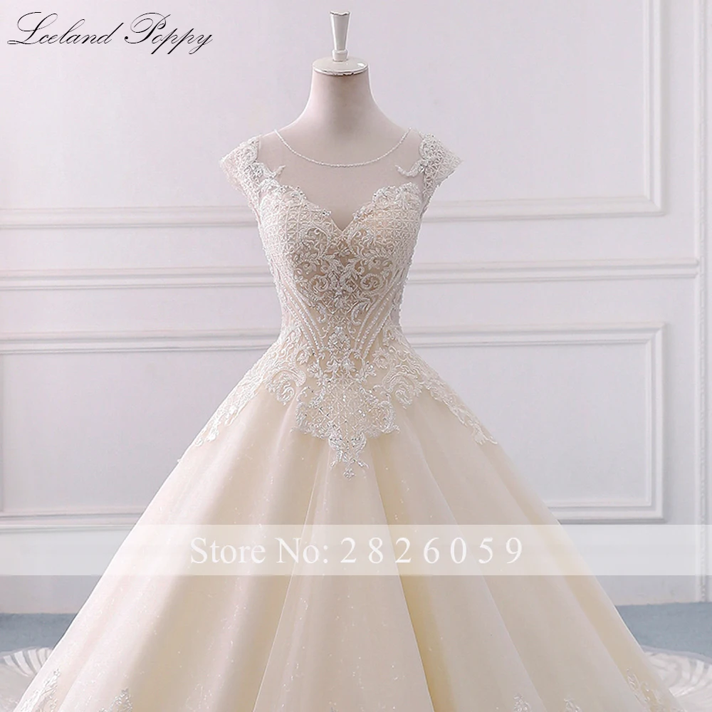 Lceland Poppy A-line Scoop Neck Champagne Wedding Dresses Cap Sleeves Crystal Beaded Bridal Gowns with Cathedral Train