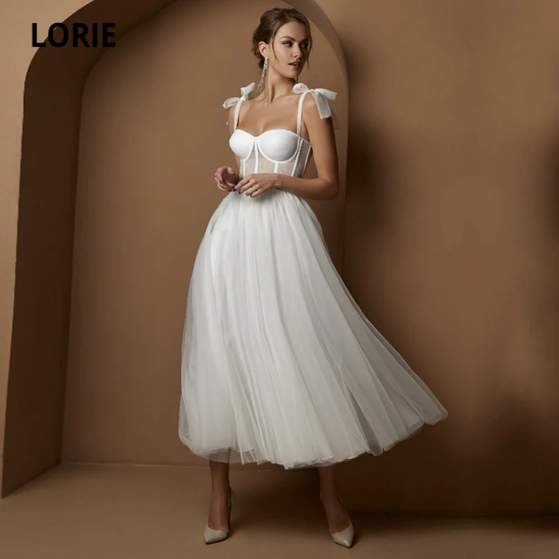 Lorie arco curto vestidos de casamento moderno desossa cinta espaguete uma linha chá comprimento branco vestido de noiva personalizado