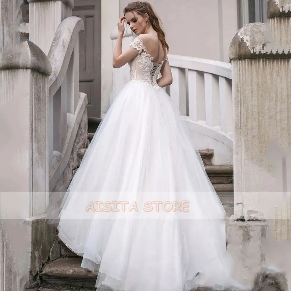 Elegant Wedding Jurken O Hals Backless Korte Mouwen Kant Applicaties Tulle Een Lijn Hof Trein Beach Bridal Gown Robe De mariee