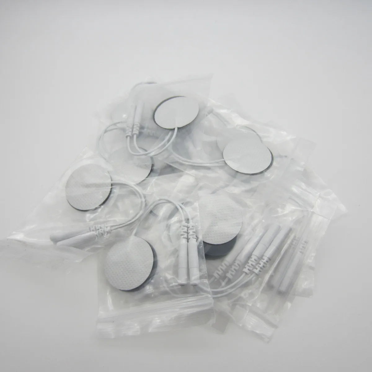 100PCS EMS Acupuncture Slimming Paster Digital Therapy Massager Round 30mm Electrode Pads 3cm Non-Woven