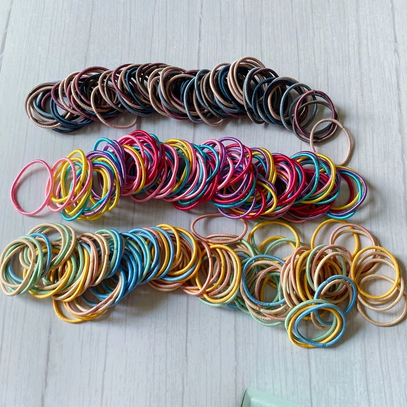 100 unids/lote niños lindo gomas pelo pequeñas bebe bandas elasticas gomillas pelo niña elasticos gomitas de pelo cola de caballo titular pelo corbata coleteros bebe niña  Accesorios para el pelo