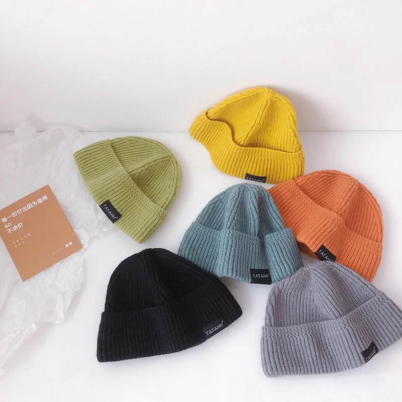 Ins children's wool hat autumn and winter solid color label knitted hat thickened warm pullover hat versatile hat fashion