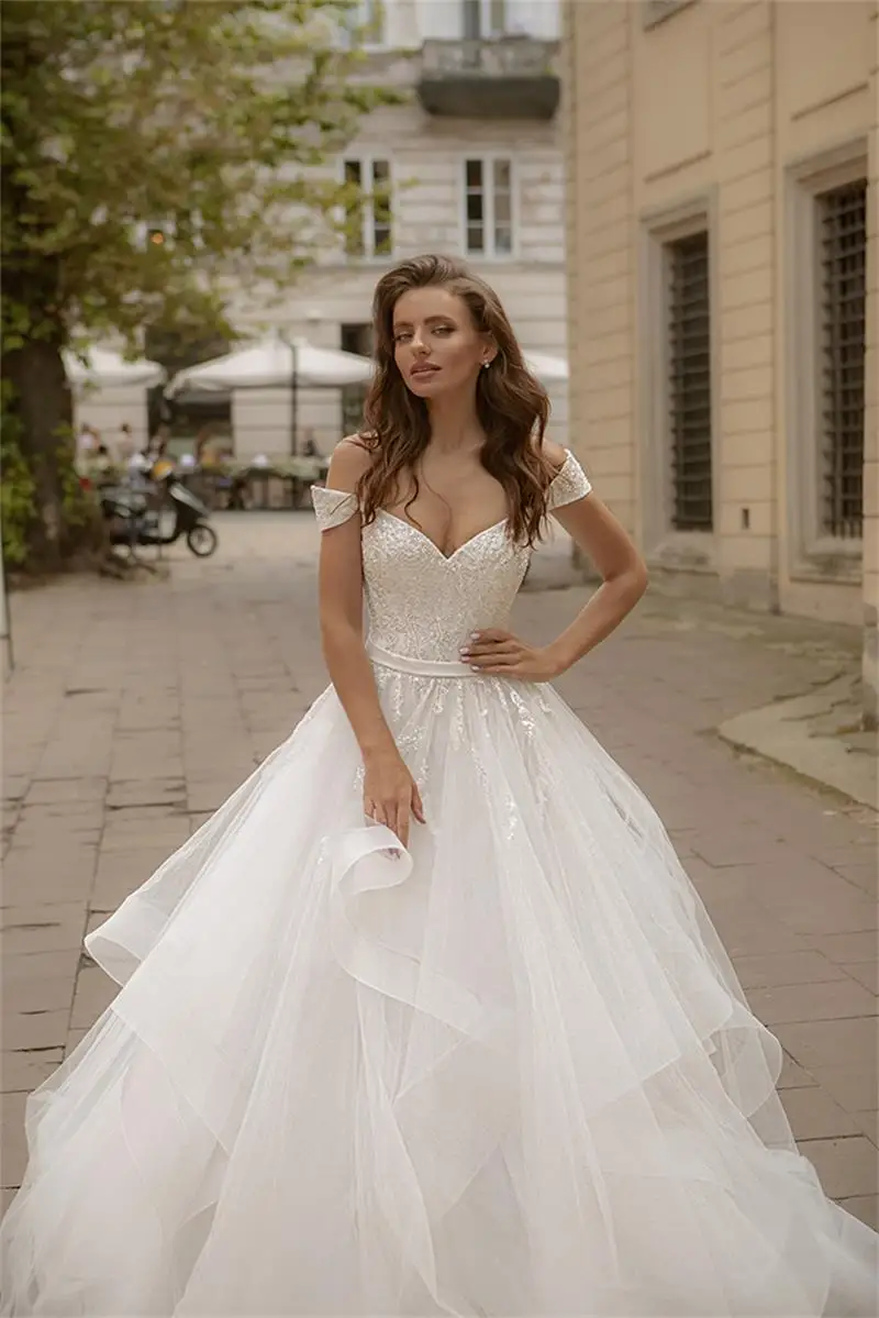 Magic Awn Mới Lệch Vai Váy Áo 2021 Ren Appliques Công Chúa Phồng Cô Dâu Đồ Bầu Phối Ren Lưng Vestidos Branco