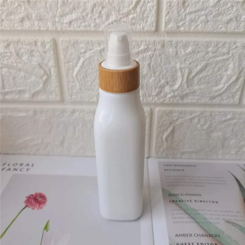 

Lotion Bottles Bulk 100ml White Porcelain Bottle with Bamboo Cap Luxury Cosmetic Packaging Custom Cosmetic Packaging