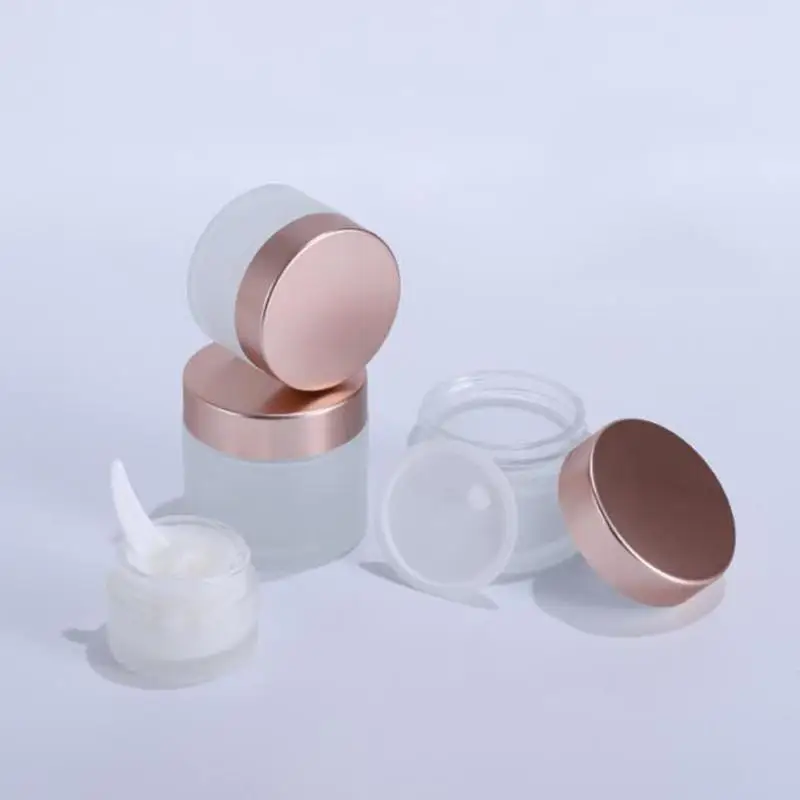 

Newest Frosted Glass Jars Cream Bottles Round Shape Cosmetic Containers With Rose Gold Cap For Face Cream Makeup Packing