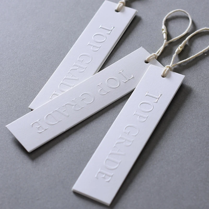 High Quality Customizing White Cardboard with Embossing Text Elegant Simplicity Design for Clothing Tag Brand Label Garment Shop