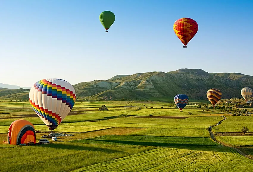 

7x5ft Hot Air Balloons Travel Fly Around World Mountain Field Custom Photo Studio Background Backdrop Vinyl 220cm x 150cm